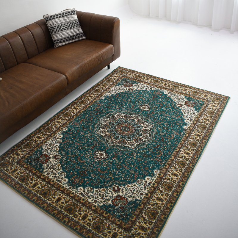 Bring this luxurious feel of a palace into your home with this Persian design rug. Adds a touch of elegance to any room.