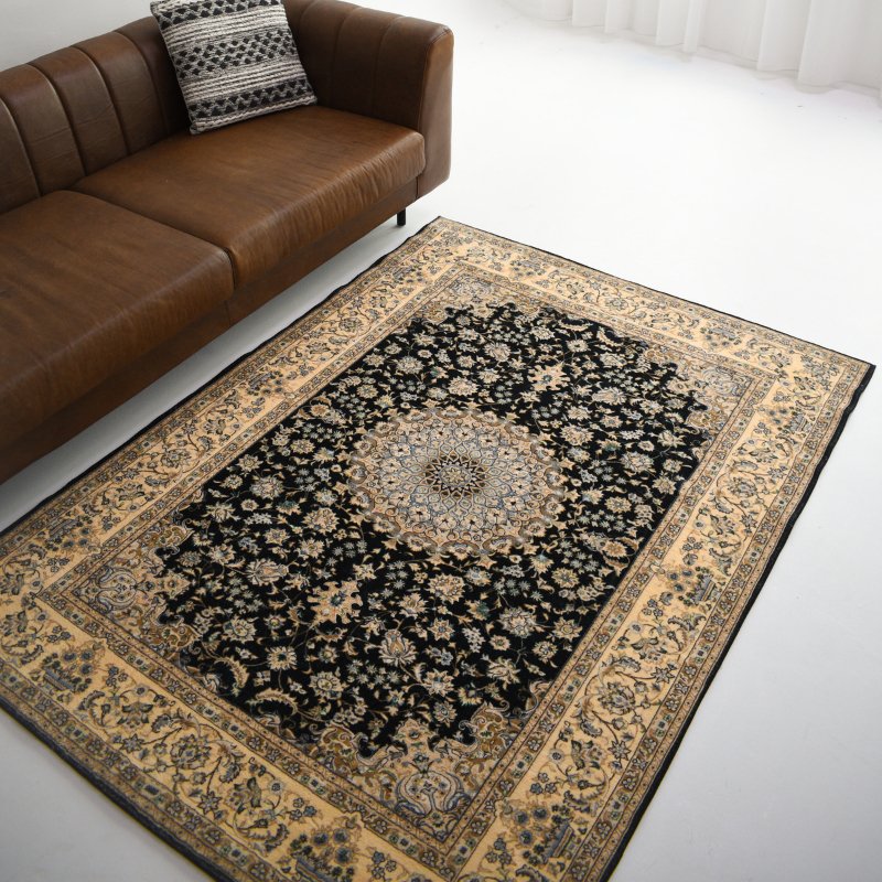 Elevate your space with luxurious black and gold Persian-inspired carpet, featuring floral patterns for timeless elegance.