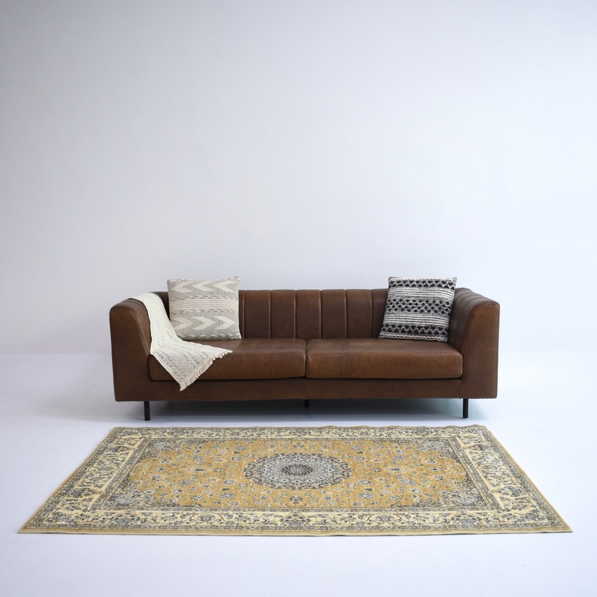 This mustard yellow and cream Persian-style carpet is the perfect choice for timeless elegance.