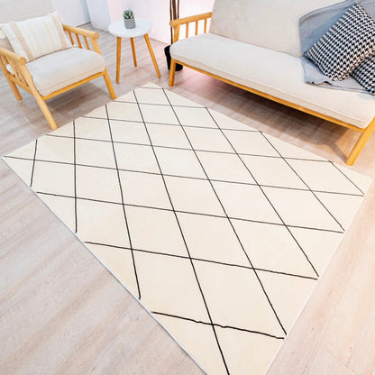 This cream carpet with a subtle black geometric pattern adds modern elegance and simplicity to any space